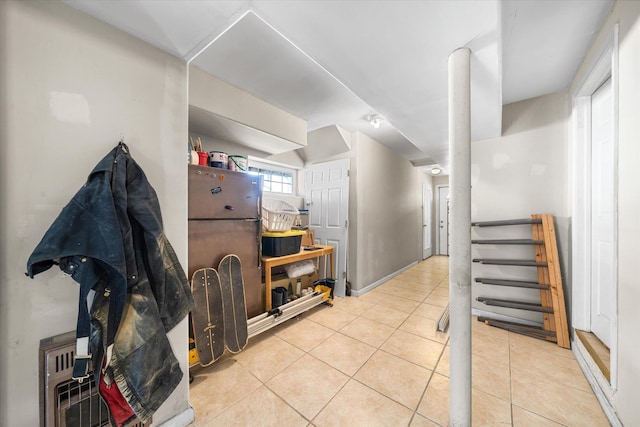 interior space with tile patterned floors