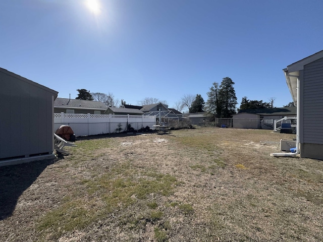 view of yard featuring a fenced backyard