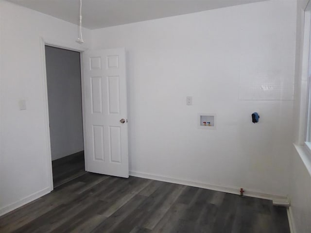 laundry room with washer hookup, laundry area, baseboards, and dark wood-style flooring