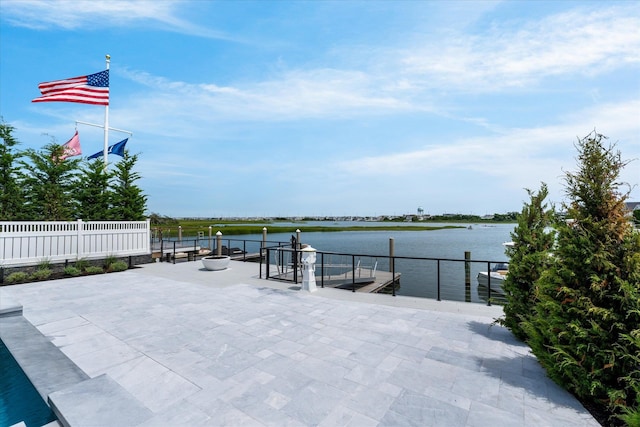 view of patio featuring a water view