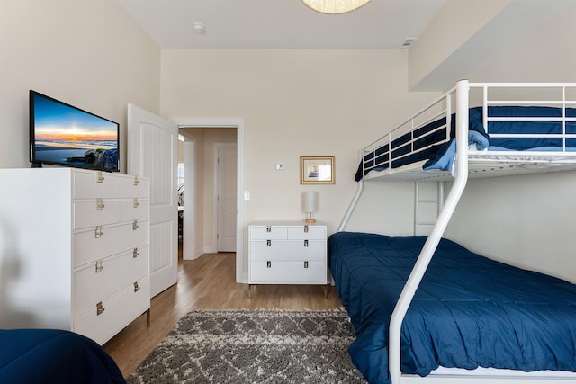 bedroom featuring wood finished floors