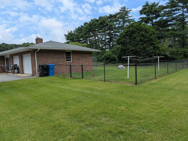 71 Perry Rd, Petersburg, NJ 08270 - view of side of home featuring a chimney, an attached garage, and brick siding