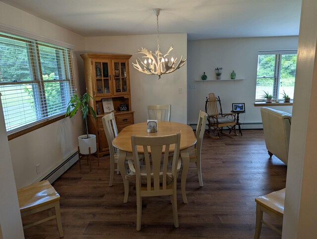 71 Perry Rd, Petersburg, NJ 08270 - dining space featuring baseboard heating, a chandelier, wood finished floors, and a baseboard heating unit