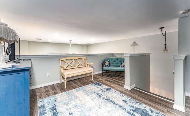 living area featuring dark hardwood / wood-style flooring