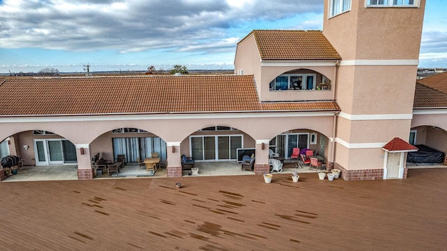 back of house featuring a patio