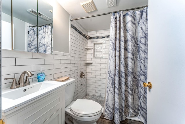 bathroom featuring backsplash, toilet, vanity, tile walls, and a shower with shower curtain