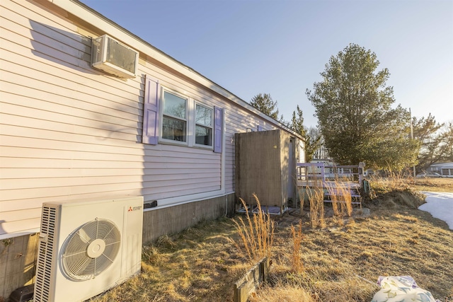 view of home's exterior with ac unit