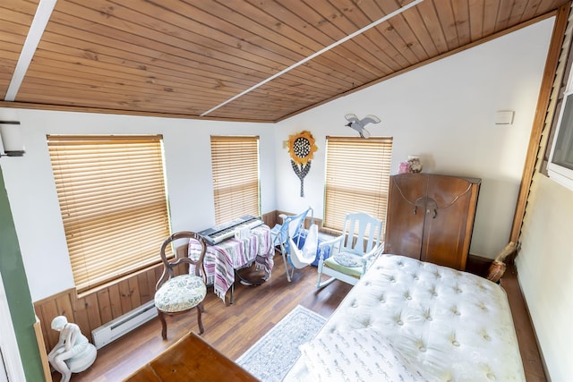 sitting room with hardwood / wood-style flooring, a baseboard radiator, lofted ceiling, and wood ceiling