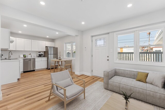 2001 Surf Ave Unit 2, North Wildwood, NJ 08260 - living area with recessed lighting, light wood-style flooring, and baseboards