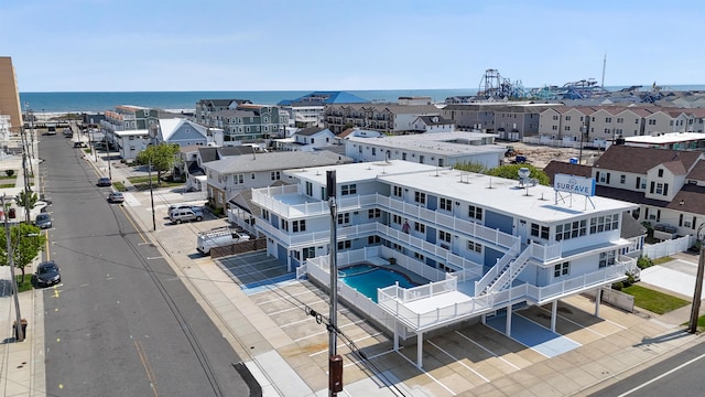 2001 Surf Ave Unit 2, North Wildwood, NJ 08260 - drone / aerial view of a pool and a nearby body of water