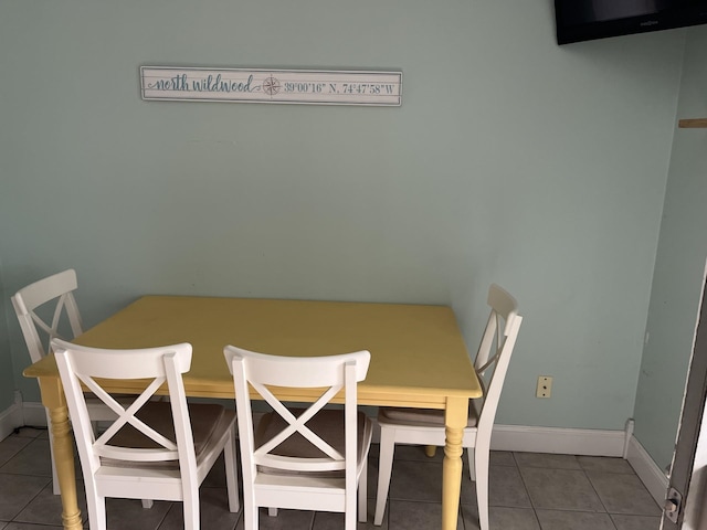 dining area with tile patterned floors