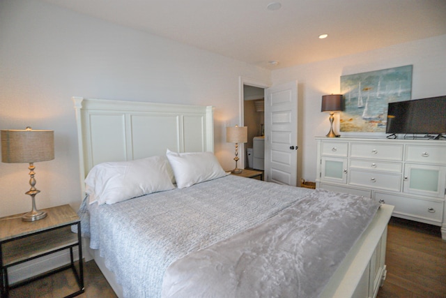 bedroom with dark wood-style floors and recessed lighting