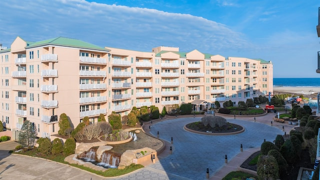 view of building exterior featuring a water view