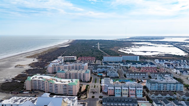 drone / aerial view featuring a view of the beach and a water view
