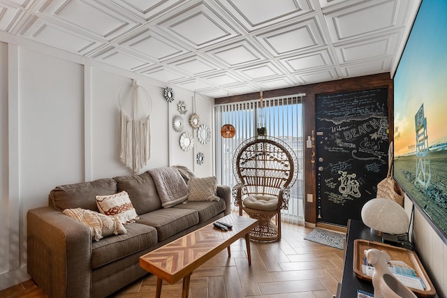 living room with parquet flooring