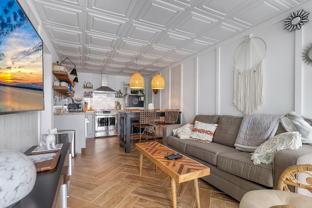 living room with parquet flooring