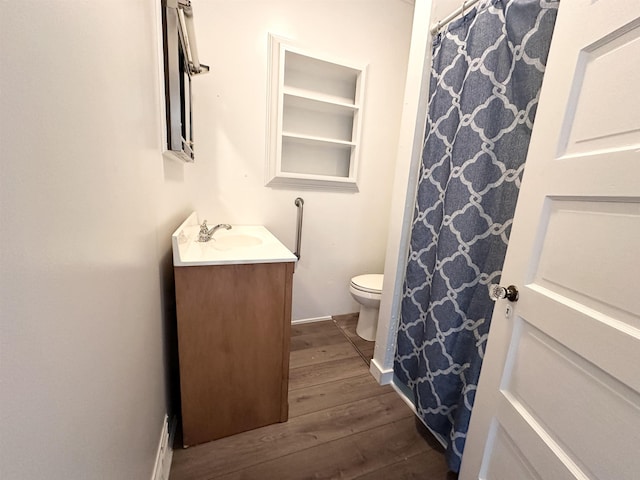 1083 Seashore Rd, Cold Spring, NJ 08204 - full bathroom with vanity, toilet, wood finished floors, and baseboards