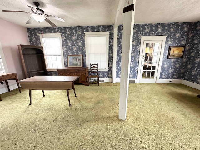 1083 Seashore Rd, Cold Spring, NJ 08204 - carpeted home office with a textured ceiling, wallpapered walls, a ceiling fan, and baseboards