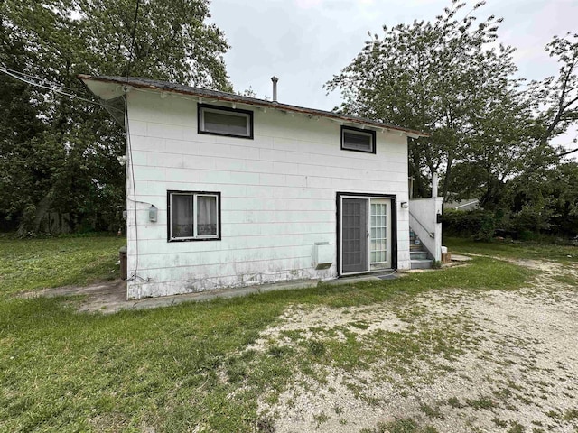 1083 Seashore Rd, Cold Spring, NJ 08204 - rear view of house featuring a yard