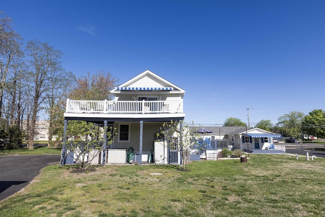 837 Seashore Rd, Lower Township, NJ 08204 - rear view of property featuring a lawn and a deck