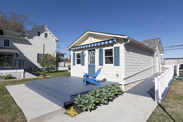 837 Seashore Rd, Lower Township, NJ 08204 - back of property with fence, a lawn, and a deck