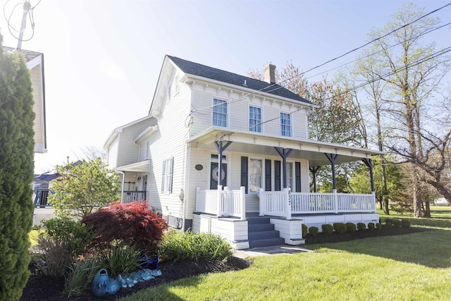 837 Seashore Rd, Lower Township, NJ 08204 - italianate home with a porch, a chimney, and a front yard