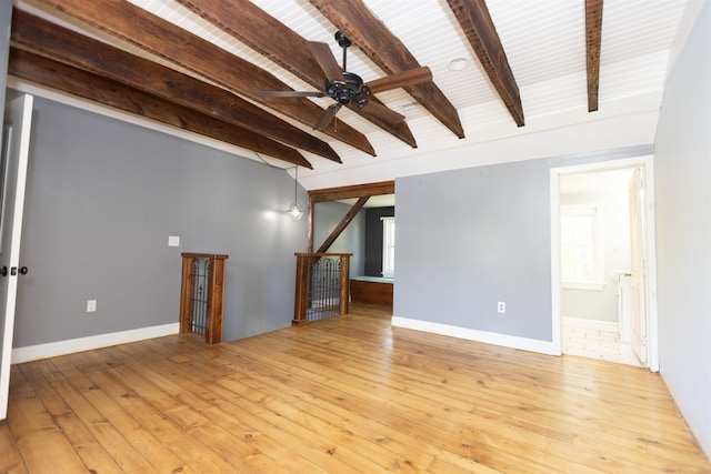 837 Seashore Rd, Lower Township, NJ 08204 - unfurnished living room with light wood-style floors, a ceiling fan, baseboards, and beam ceiling