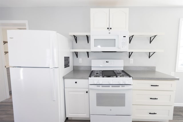 837 Seashore Rd, Lower Township, NJ 08204 - kitchen with open shelves, white cabinets, dark wood-style floors, and white appliances
