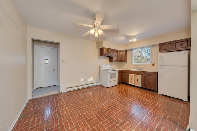 kitchen featuring ceiling fan, sink, white appliances, and a baseboard heating unit