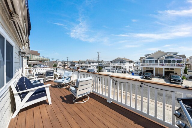 630 21st St Fl 2Nd, Avalon, NJ 08202 - wooden terrace with a residential view