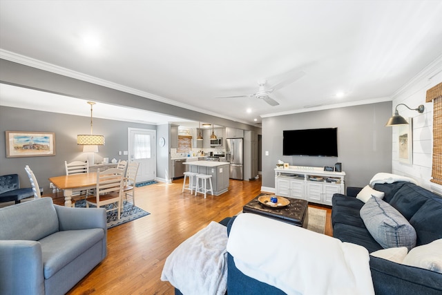630 21st St Fl 2Nd, Avalon, NJ 08202 - living room featuring ornamental molding, light wood finished floors, ceiling fan, and recessed lighting