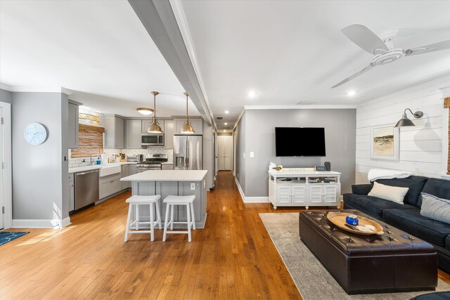 630 21st St Fl 2Nd, Avalon, NJ 08202 - living area with ceiling fan, crown molding, light wood-style flooring, and recessed lighting