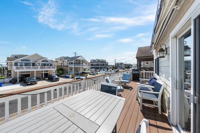 630 21st St Fl 2Nd, Avalon, NJ 08202 - wooden terrace with a residential view