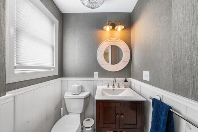 630 21st St Fl 2Nd, Avalon, NJ 08202 - bathroom with vanity, a wainscoted wall, and wallpapered walls