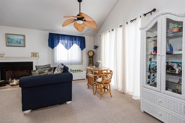 117B W Topeka Ave Unit B, Wildwood Crest, NJ 08260 - living area with light carpet, ceiling fan, a fireplace, and vaulted ceiling