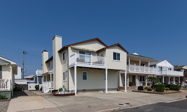 117B W Topeka Ave Unit B, Wildwood Crest, NJ 08260 - view of property featuring a chimney, a balcony, and crawl space