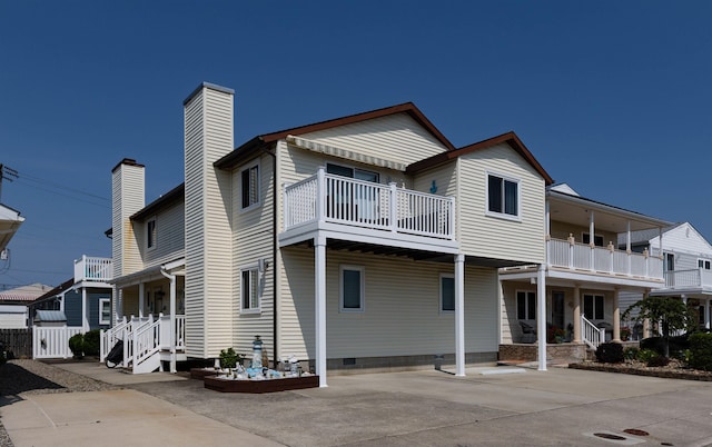 117B W Topeka Ave Unit B, Wildwood Crest, NJ 08260 - view of front of property featuring a balcony, a chimney, and crawl space