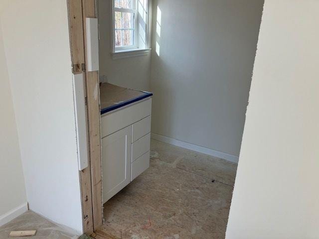 bathroom with baseboards