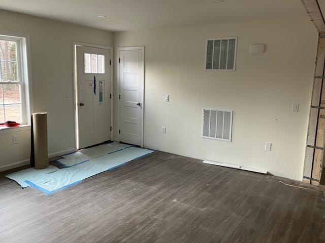 entryway with visible vents and dark wood finished floors