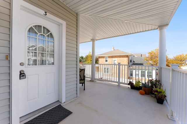 doorway to property featuring a porch