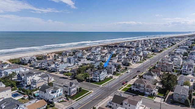 bird's eye view featuring a water view and a residential view