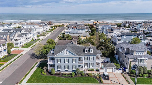 aerial view featuring a water view and a residential view