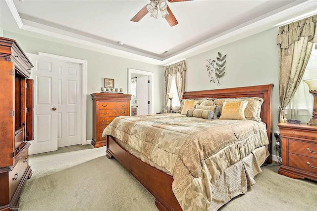 48 Cedar Meadow Dr, Cape May Court House, NJ 08210 - bedroom with a raised ceiling, light carpet, ensuite bath, and a ceiling fan