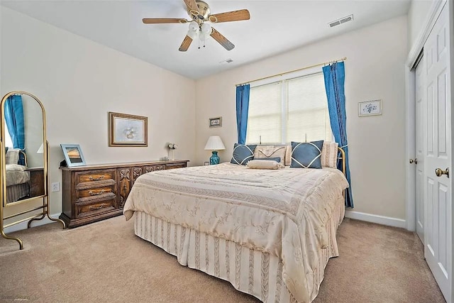 48 Cedar Meadow Dr, Cape May Court House, NJ 08210 - bedroom with baseboards, a closet, visible vents, ceiling fan, and light colored carpet