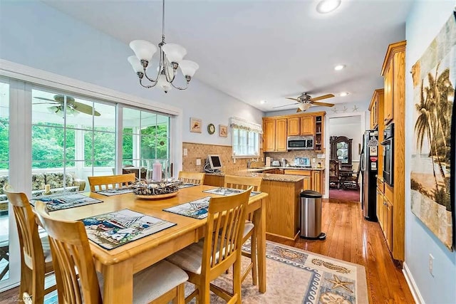 48 Cedar Meadow Dr, Cape May Court House, NJ 08210 - dining room with light wood-style flooring, recessed lighting, and ceiling fan with notable chandelier
