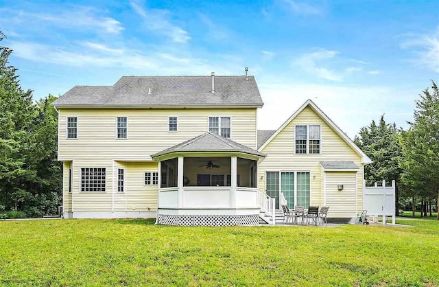 48 Cedar Meadow Dr, Cape May Court House, NJ 08210 - back of property with a patio area, roof with shingles, a sunroom, and a lawn