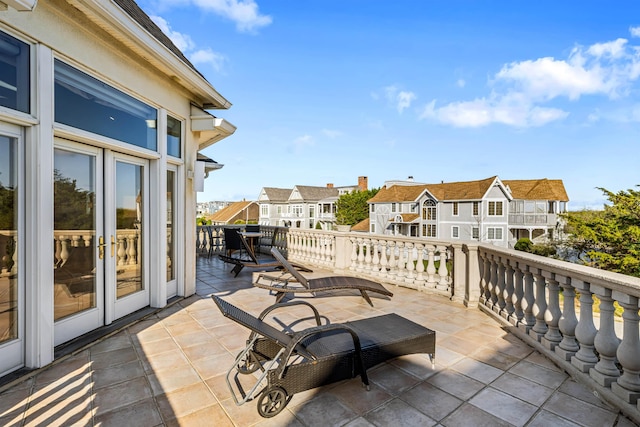 view of patio / terrace with outdoor dining area and a residential view