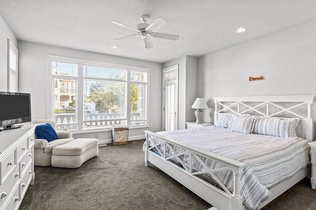 bedroom featuring dark carpet, baseboards, recessed lighting, and a ceiling fan