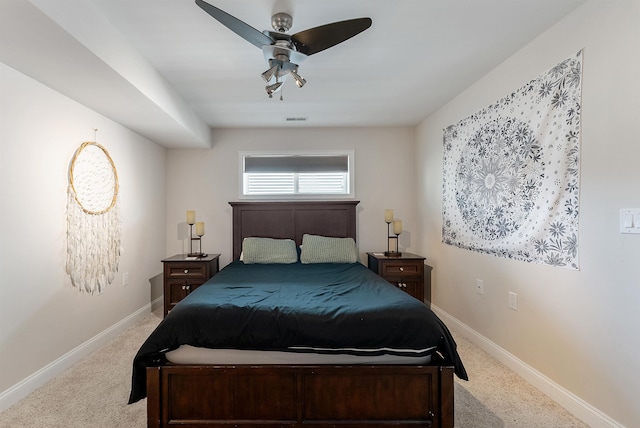 bedroom with light colored carpet and ceiling fan