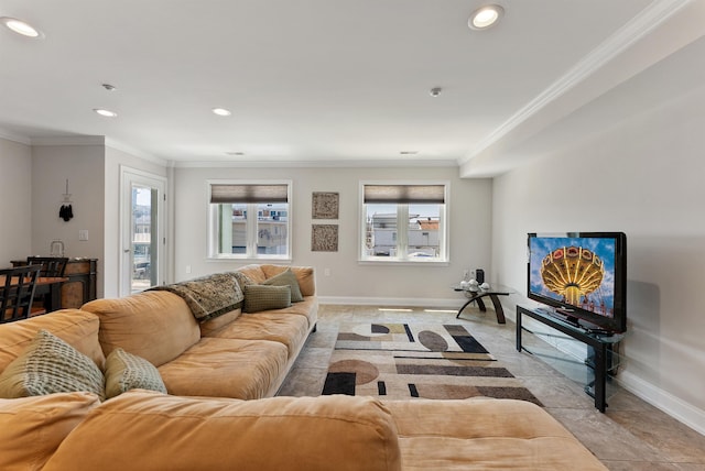 living room with a healthy amount of sunlight and ornamental molding